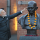 Indian Prime Minister Narendra Modi with South Africa’s most famous Indian resident, Mahatma Gandhi.